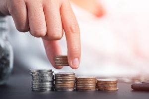 Hand Stacking Coins